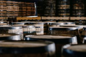 Rows of wooden casks in a warehouse