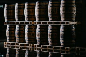 Stacked pallets of wooden casks